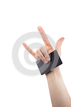 hand with rock and roll sign holding blank for card, Bank card, isolated on white background, copy space