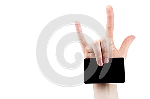 Hand with rock and roll sign holding blank for card, Bank card,  on white background, copy space