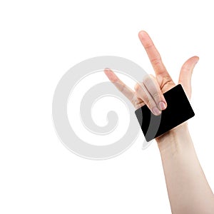 hand with rock and roll sign holding blank for card, Bank card,  on white background, copy space