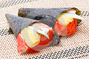 Hand Rolled Temaki Sushi Traditional Japanese Cuisine.