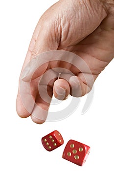 Hand rolling two red dice