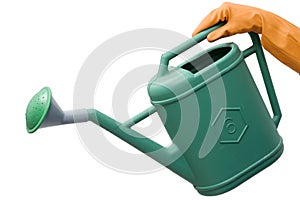 Hand with rubber glove holding a watering can