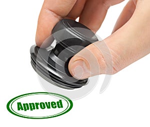 Hand and rubber stamp Approved photo