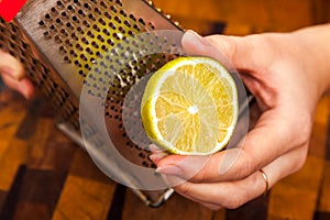 The hand rubbing a lime