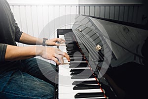Hand`s man playing piano