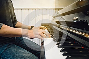 Hand`s man playing piano