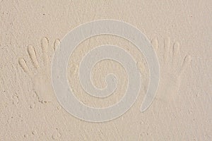 HAND'S PRINTS IN THE SAND !