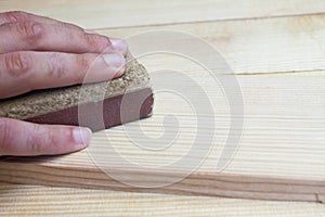 Hand sanding wood