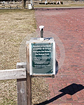 Hand sanitizer at entrance to park photo