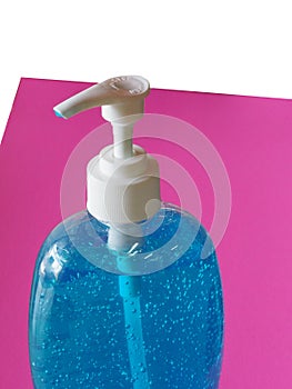 Hand Sanitizer, gel alcoholic mixture with gelatin in clear Plastic bottle with pump pushing, washing clean dirty to prevent germs