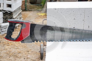 Hand saw for aerated concrete blocks. A tool for working with aerated concrete bricks.