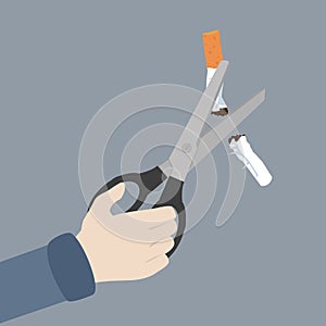 Hand Scissors cutting a cigarrette