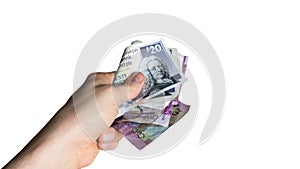 Scottish money hand - bribery, pay cash, giving money, corruption concept photo