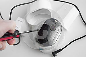 Fixing surveillance camera