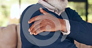 Hand and senior man with arm pain, stress or arthritis, inflammation or discomfort at home. Closeup, shoulder and