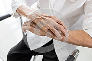 Hand of senior woman scratching her arm,itchy skin,dry skin problem,old elderly with short fingernails after trim nails,short cut