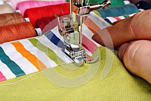 Hand sewing on a machine