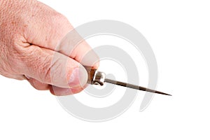 Hand with a sharp pricker