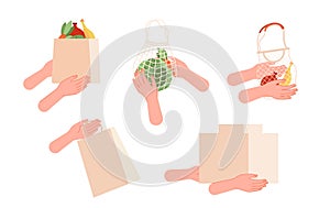 Hand with shopping bags. Delivery, food purchase or parcels. Online shopping metaphor, isolated hands holding packs