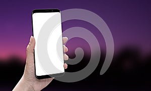 Hand showing modern smart phone with round edges