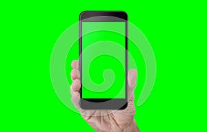 Hand showing phone with isolated screen and background in green