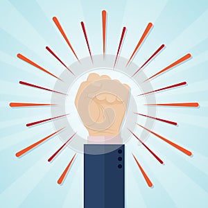 Hand showing raised fist on a radial comic background