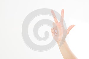 Hand showing the sign of victory or peace closeup isolated on white background.Front view. Mock up. Copy space. Template. Blank.