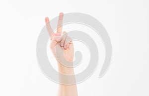 Hand showing the sign of victory or peace closeup isolated on white background.Front view. Mock up. Copy space. Template. Blank.