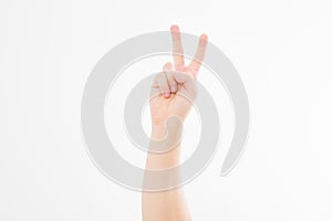 Hand showing the sign of victory or peace closeup isolated on white background.Front view. Mock up. Copy space. Template. Blank.