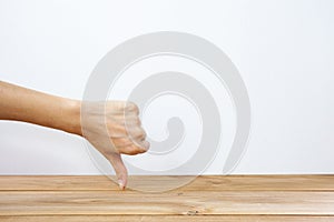 Hand showing thumb down