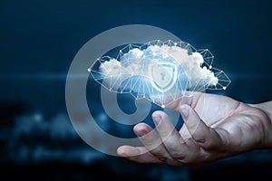 Hand shows a data cloud with a protective shield.