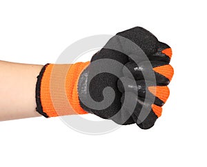 Hand shows fist in a black and orange rubber glove