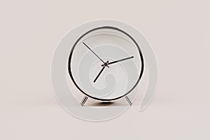 hand shows standing time. High quality studio photo of a clock. The concept of time and the rules of time in work