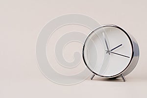 hand shows standing time. High quality studio photo of a clock. The concept of time and the rules of time in work