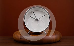 hand shows standing time. High quality studio photo of a clock. The concept of time and the rules of time in work