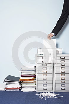 Hand Shredding Document In Office