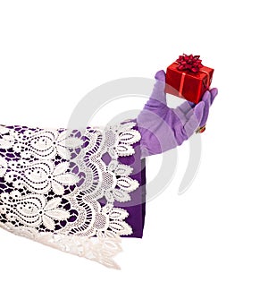 Hand of Sinterklaas showing gift. Isolated