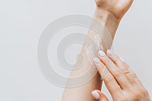 Hand Skin Care. Close Up Of Female Hands Applying Cream, Lotion.