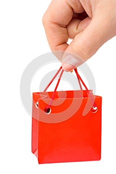 Hand with small bag