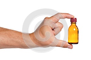 Hand with small bottle