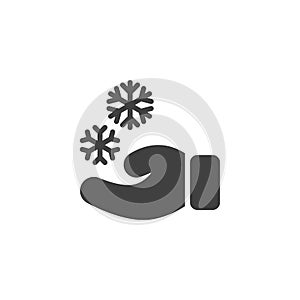 Hand and snowflake vector icon