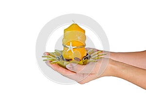 Hand with spa candle