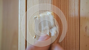 Hand spackling a round countersunk hole with head