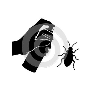 a hand spritzing a bug