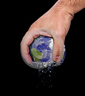 Hand squeeze earth photo