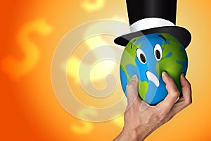 Hand squeezing the world