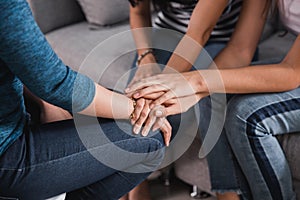 Hand stack calming sad friend photo