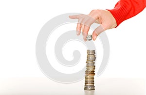 Hand with stack of coins