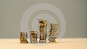 Hand stacking coins. Saving money, managing home budget.