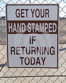 Hand stamp reminder sign